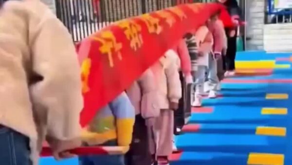 In a Chinese school, two teachers explained static electricity to students in a fun and…