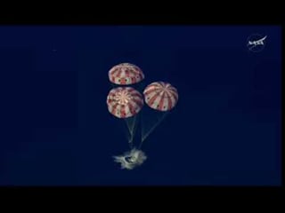 Artemis II splashes down