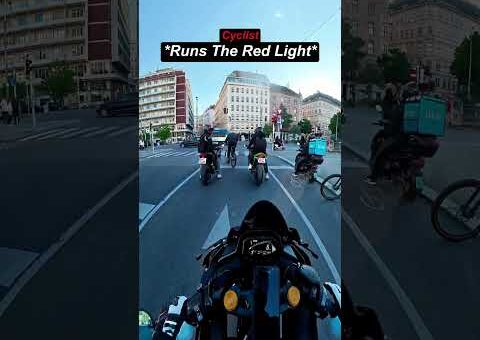 Cyclist ignores red light then got instant karma