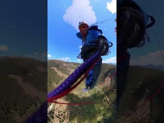 Plane hits paraglider