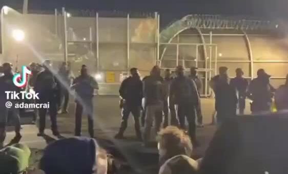 Hostages at Delaney Hall flicker lights in acknowledgement, showing protesters they know they are not…