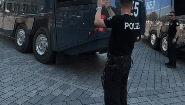 Berlin police using water cannons to cool crowds in the heat